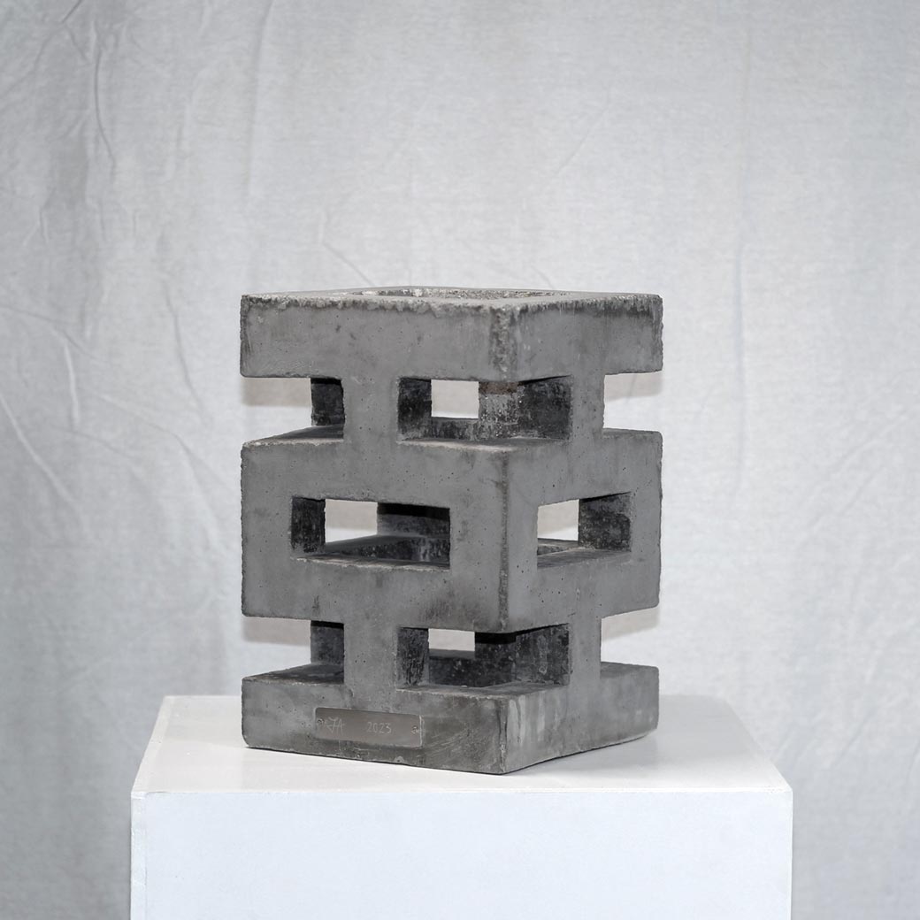 Photograph of geometric sculpture made of concrete