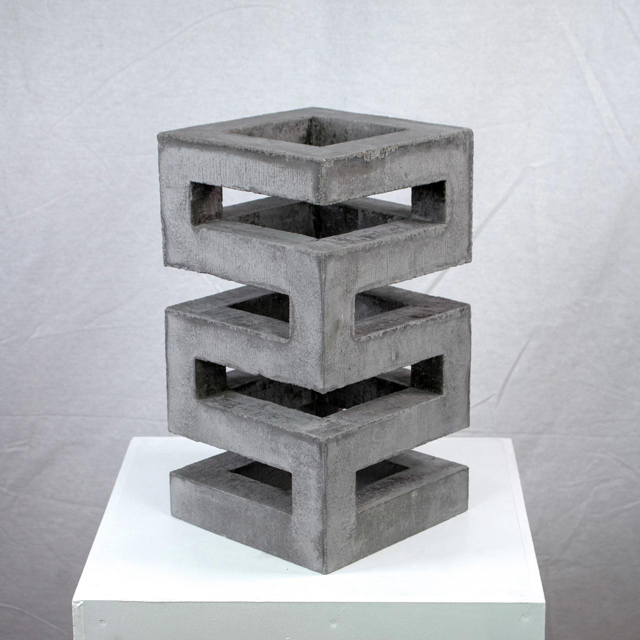 Photograph of geometric sculpture made of concrete