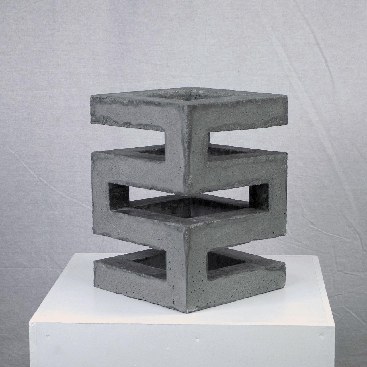 Photograph of geometric sculpture made of concrete