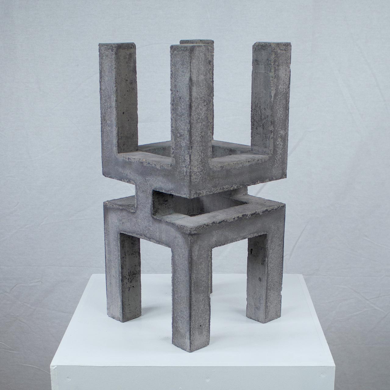 Photograph of geometric sculpture made of concrete