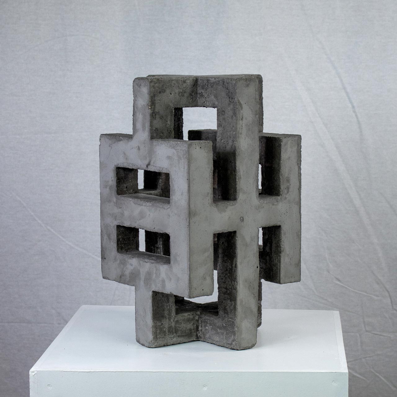 Photograph of geometric sculpture made of concrete