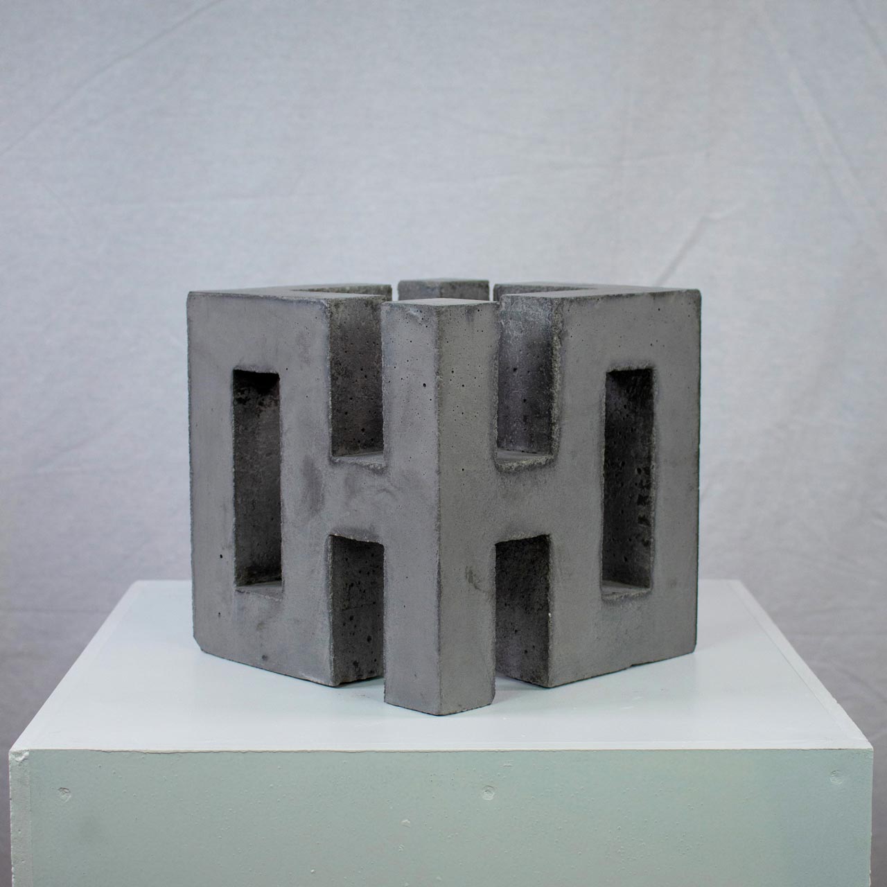 Photograph of geometric sculpture made of concrete