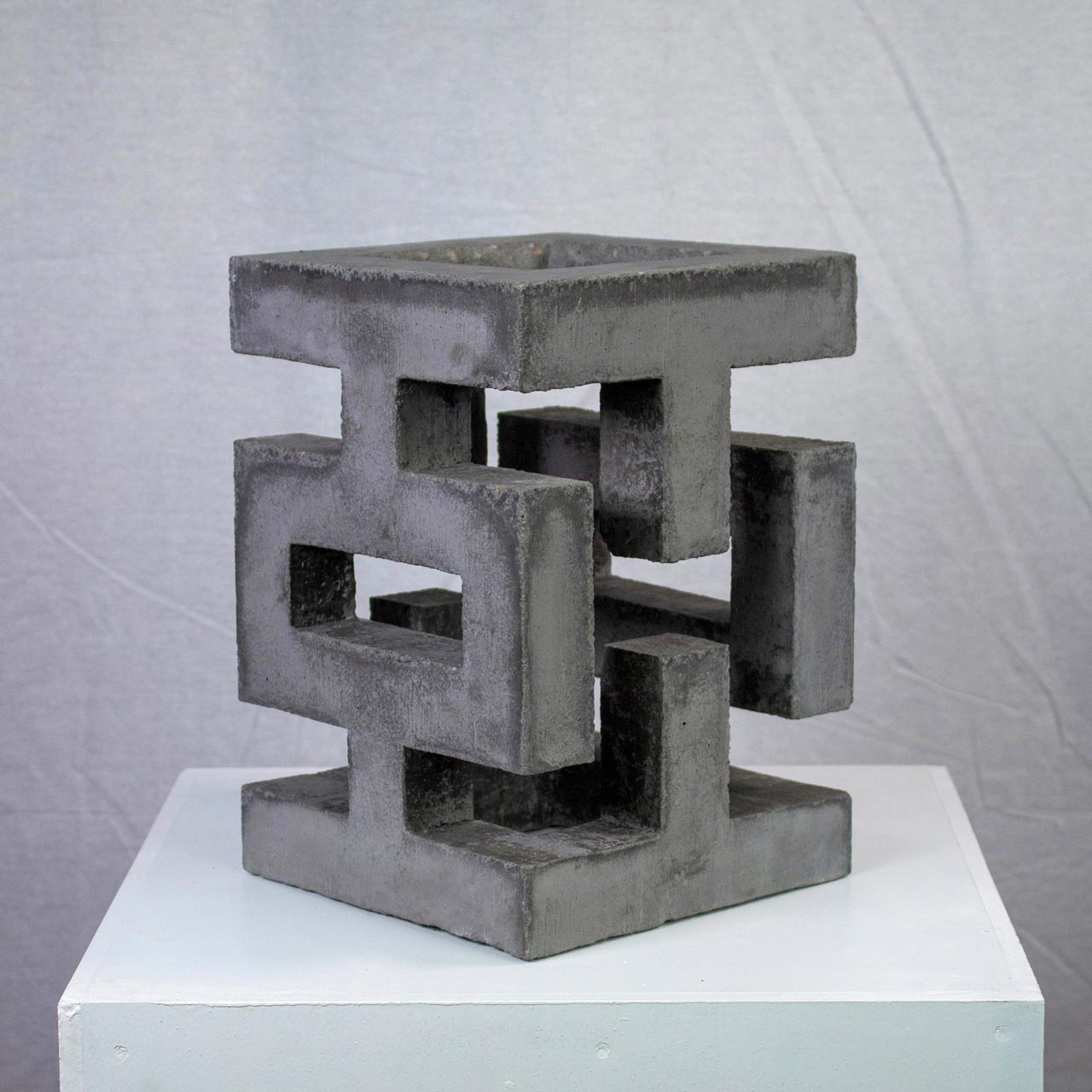 Photograph of geometric sculpture made of concrete