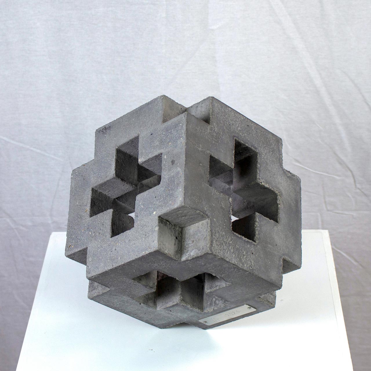 Photograph of geometric sculpture made of concrete