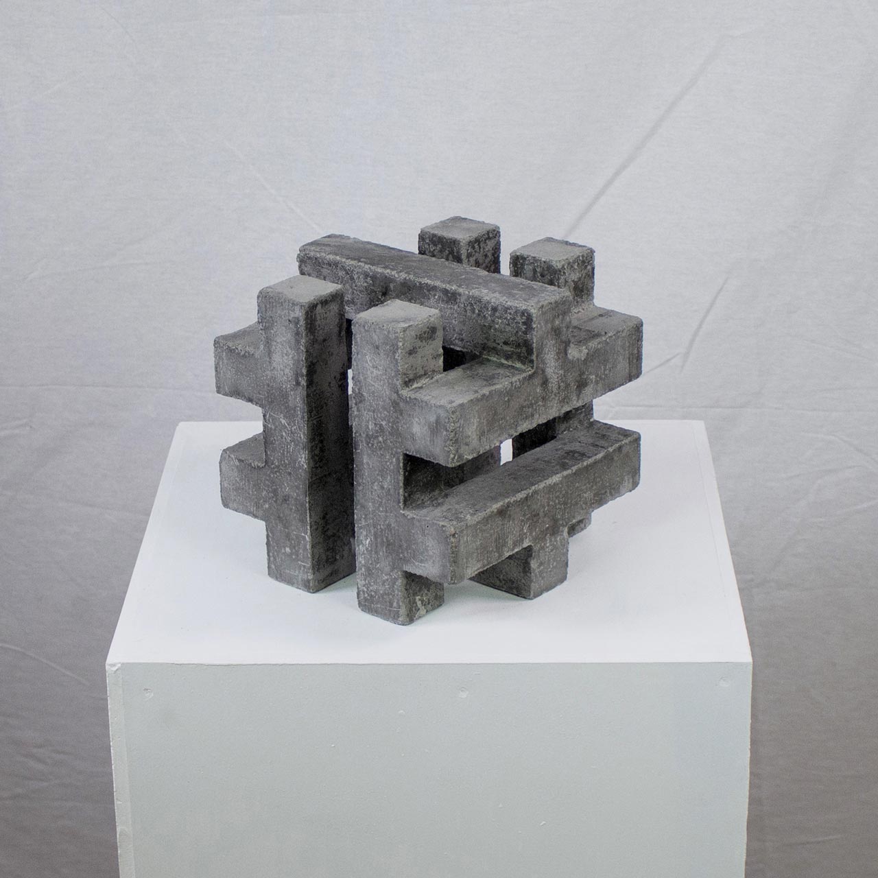 Photograph of geometric sculpture made of concrete