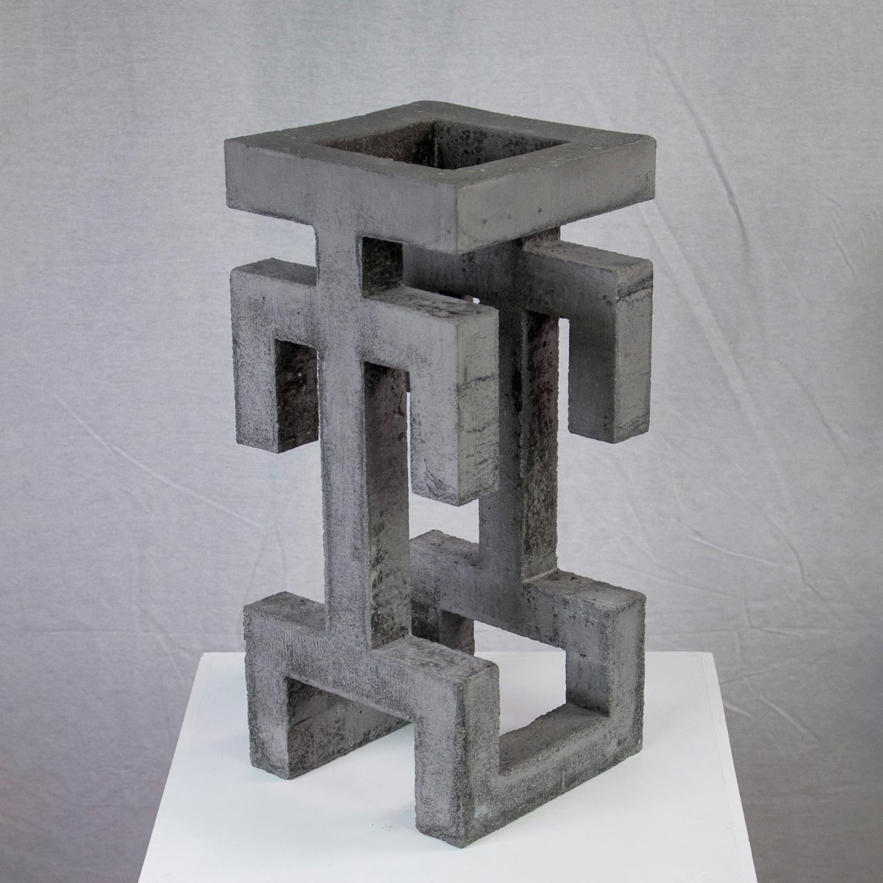 Photograph of geometric sculpture made of concrete