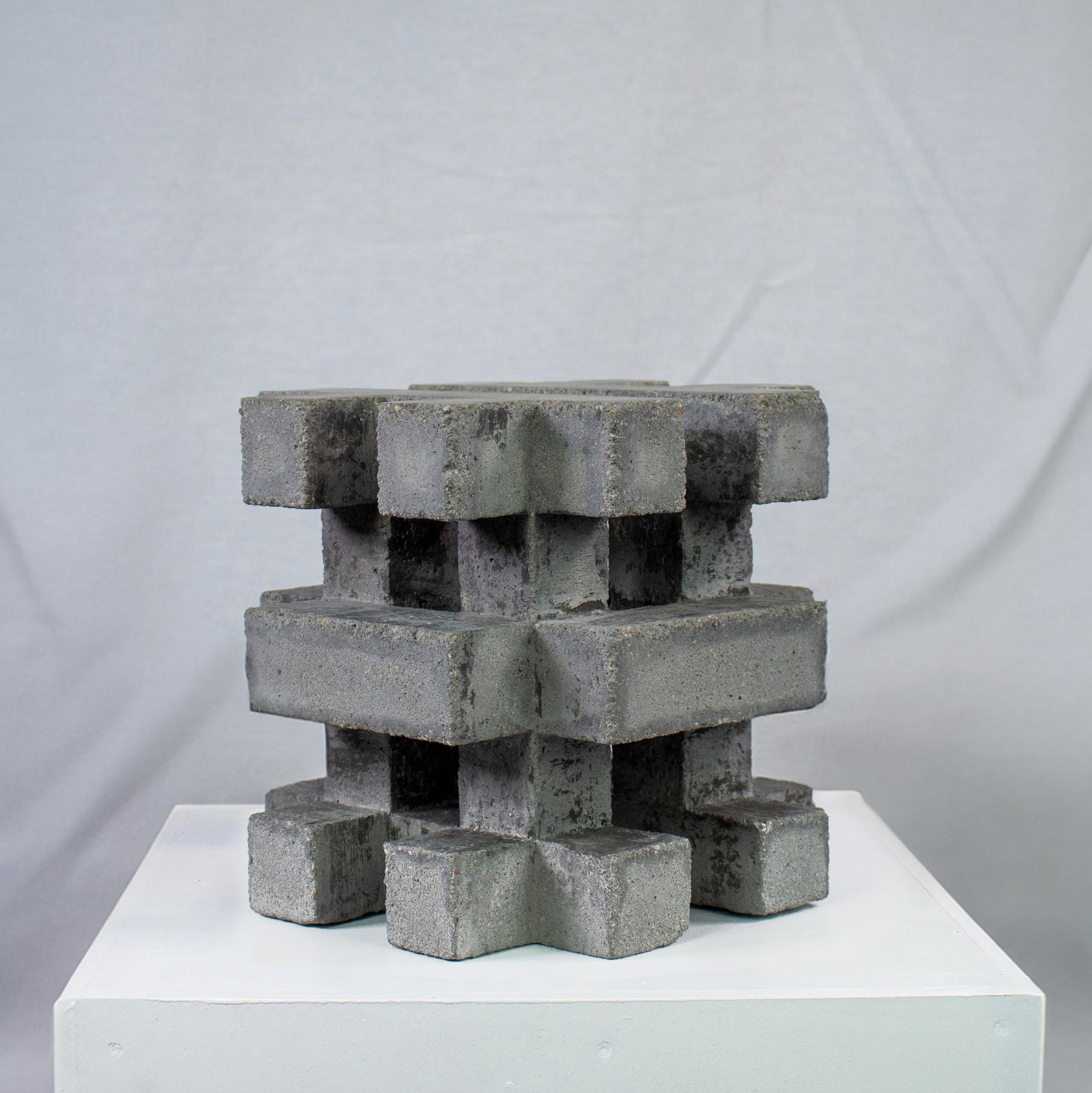 Photograph of geometric sculpture made of concrete