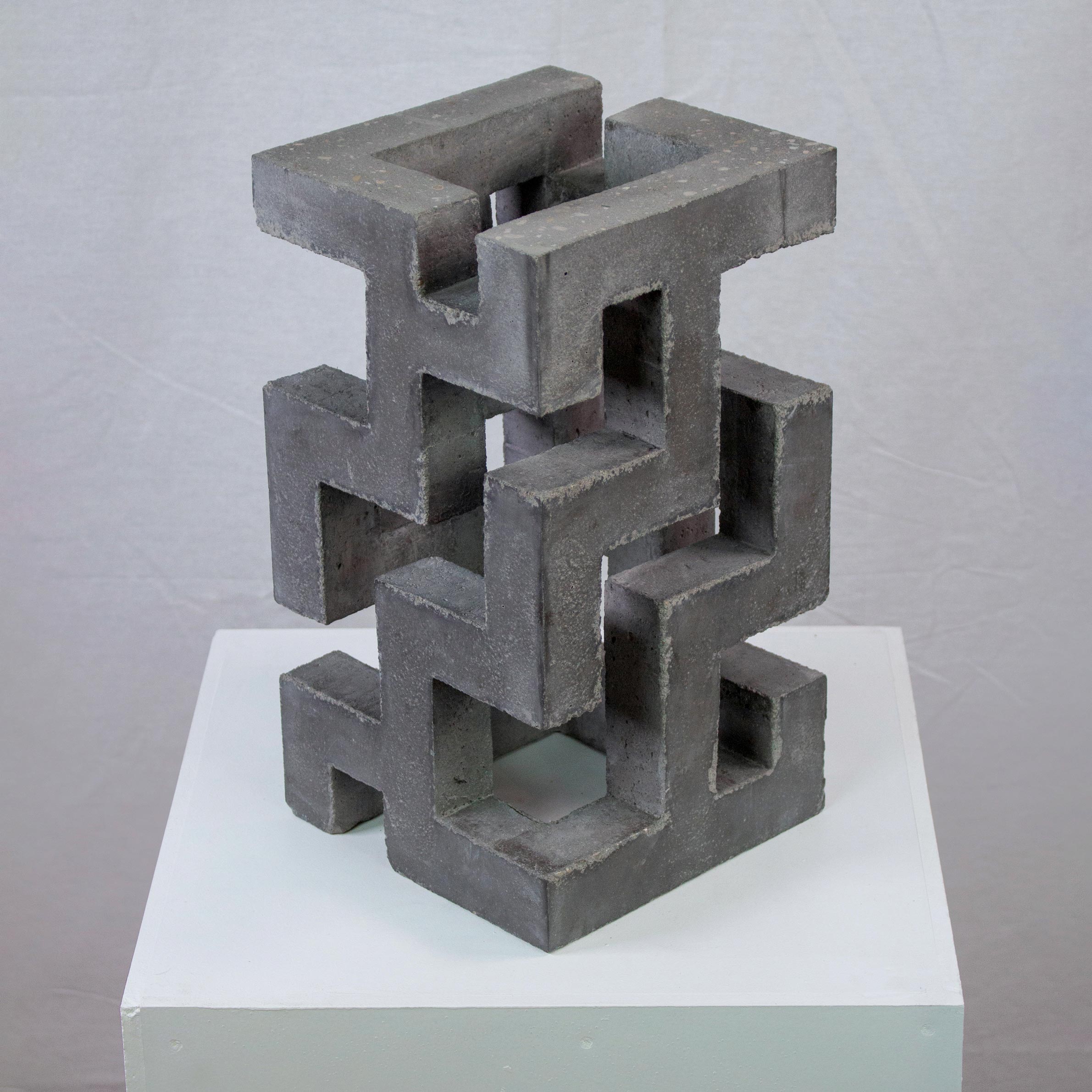 Photograph of geometric sculpture made of concrete